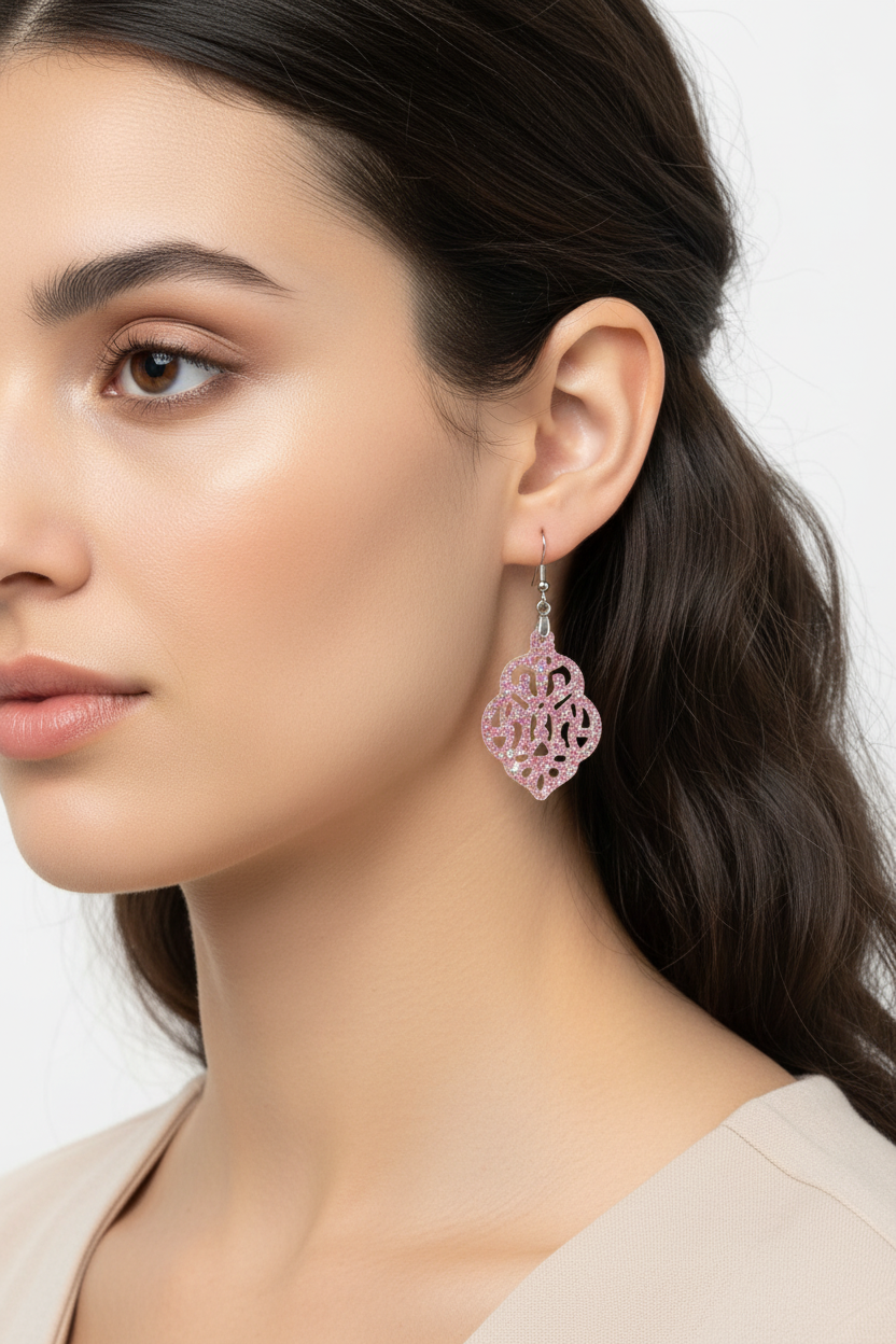Pink glitter Moroccan lantern earrings on model - retry