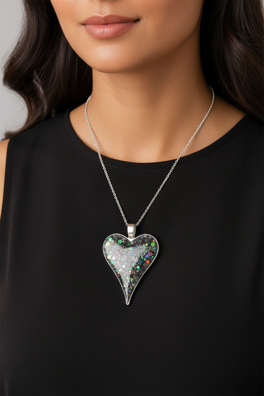 Silver holographic elongated heart pendant on model